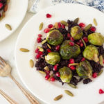 Roasted Brussels Sprouts Over Miso-Black Rice With Pomegranate & Toasted Pumpkin Seeds