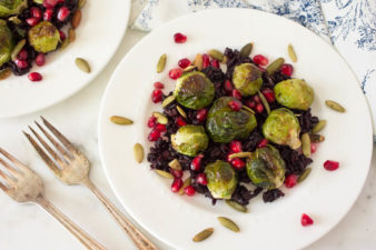 Roasted Brussels Sprouts Over Miso-Black Rice With Pomegranate & Toasted Pumpkin Seeds by Parsley In My Teeth, healthy holiday side dishes, vegan holiday side dishes